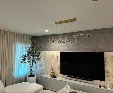Living room with backlit media wall